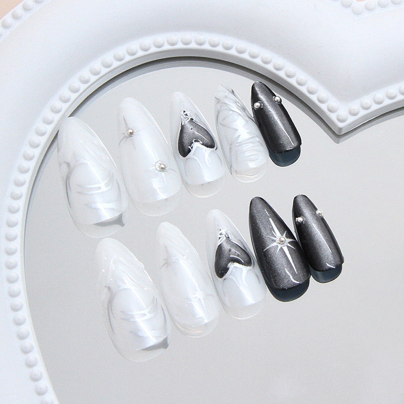 Faux ongles noirs effet œil de chat