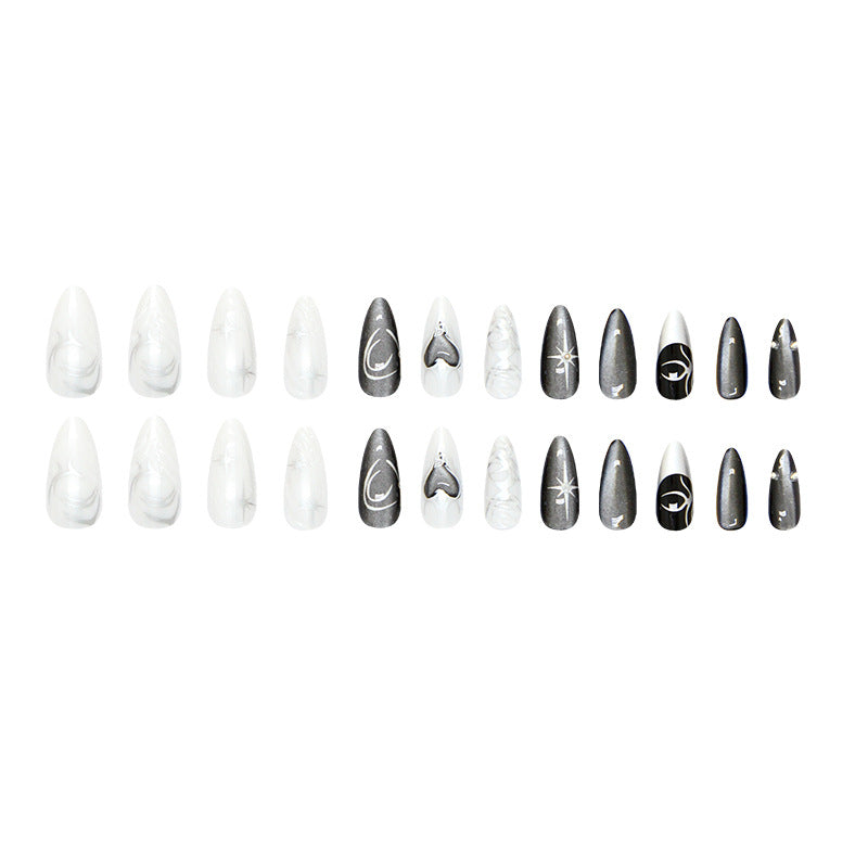 Faux ongles noirs effet œil de chat