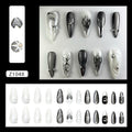 Faux ongles noirs effet œil de chat