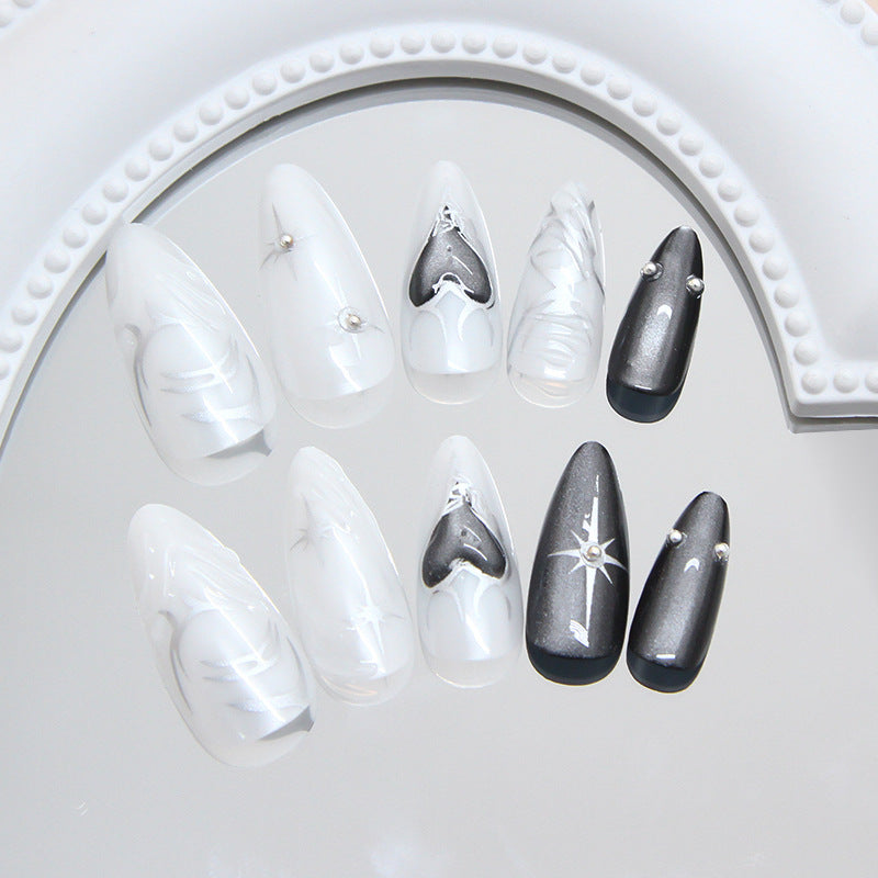 Faux ongles noirs effet œil de chat